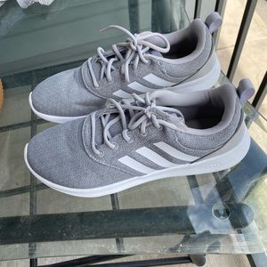 Gray and white Adidas cloud foam shoes.